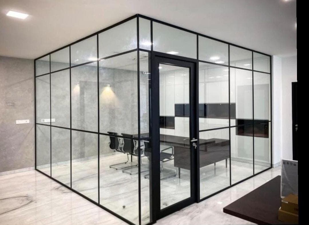 Floor-to-ceiling frameless glass office wall