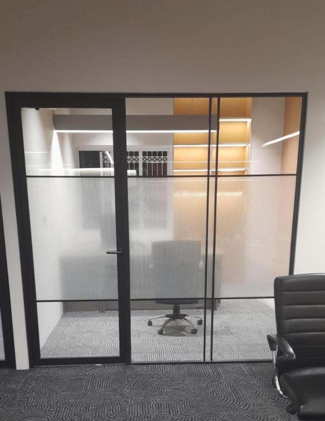 Glass meeting-room partition fitted by Fabrockers in Bengaluru